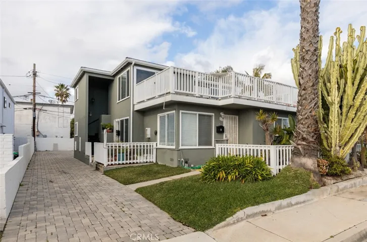 Stunning triplex in the heart of San Clemente with ocean views and just a few blocks to the San Clemente Pier.