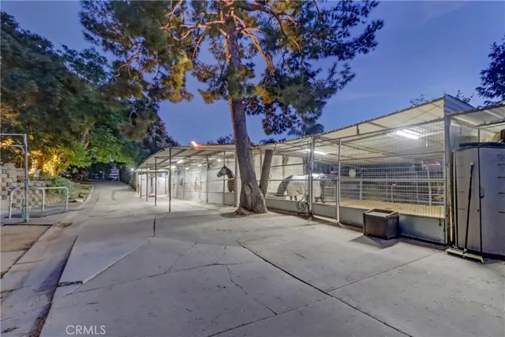 Stable looking to street at night