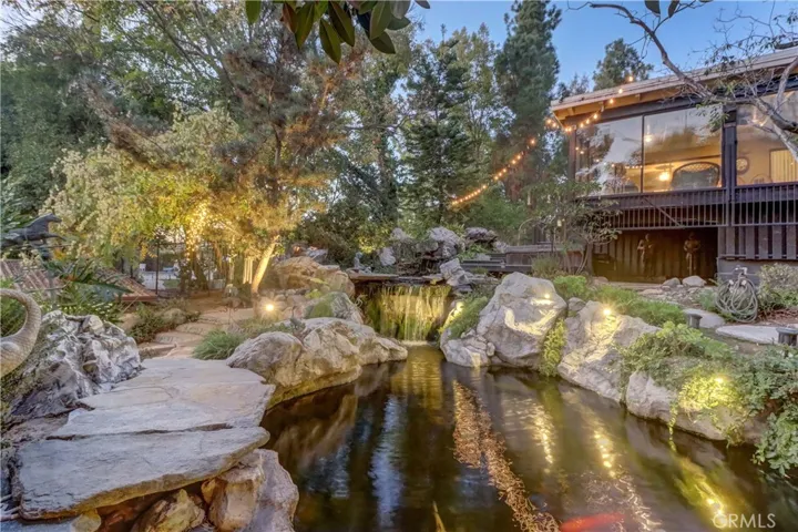 Koi pond is 7ft deep and can be converted to a pool