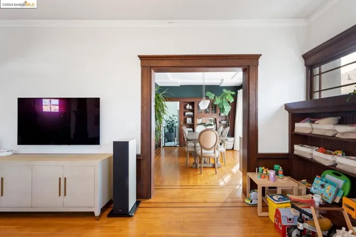 LIVING ROOM W/ BUILT IN BOOKCASES