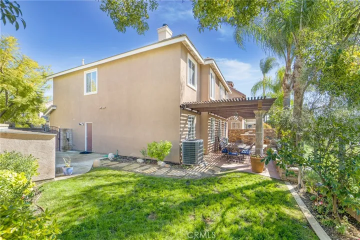 Looking towards the BBQ island and water feature.