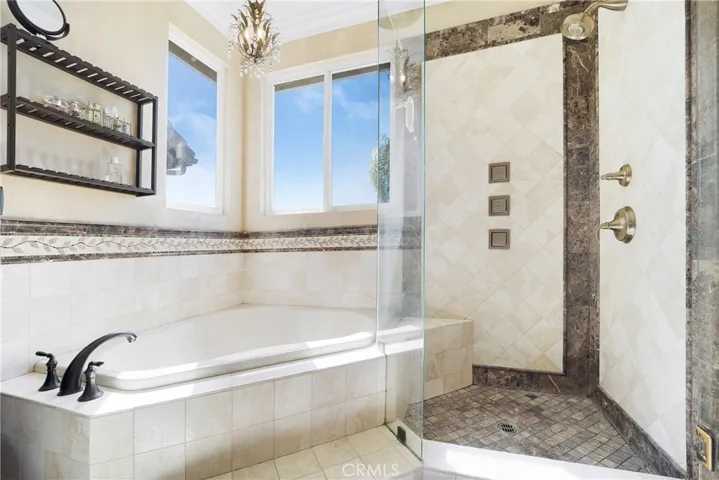 Soaking tub and separate shower.