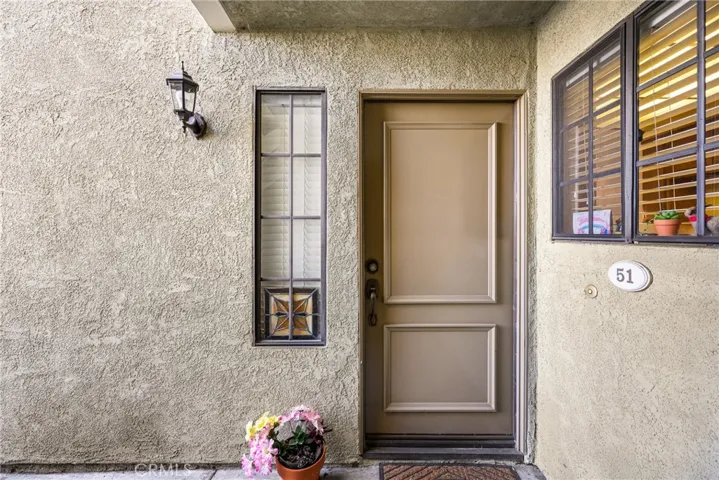 You are home and ready to gain entry to your new home. Kitchen window is just to the right.