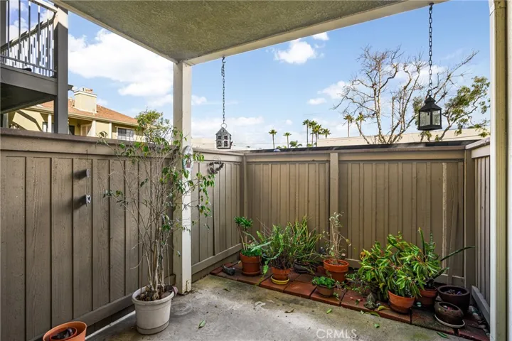 Your private patio area, closet storage to the right. Plenty of room for a small vegetable, flower, herbs, or cacti garden. The above deck offers welcoming shade.