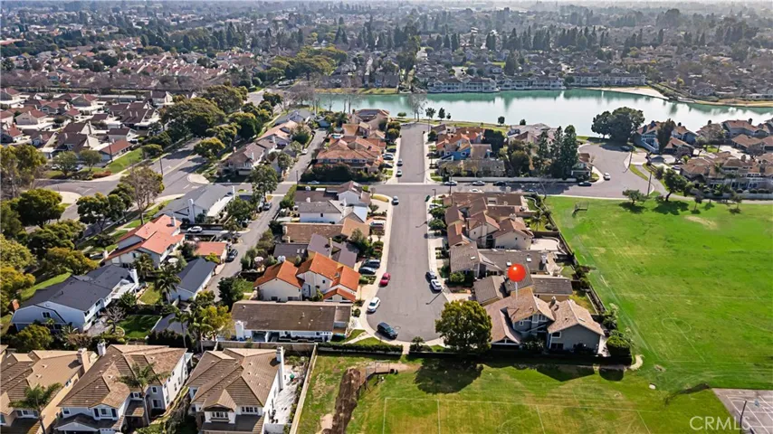 Location Location Location. 2 blocks to the North Lake, One of a few homes siding Lemon Grass Park!