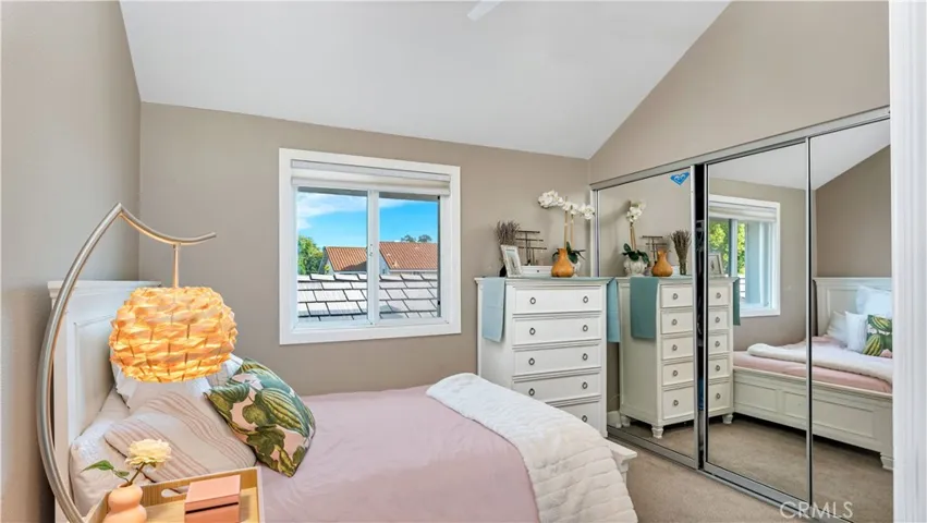 One of 4 upstairs upstairs bedrooms features a wall length closet.