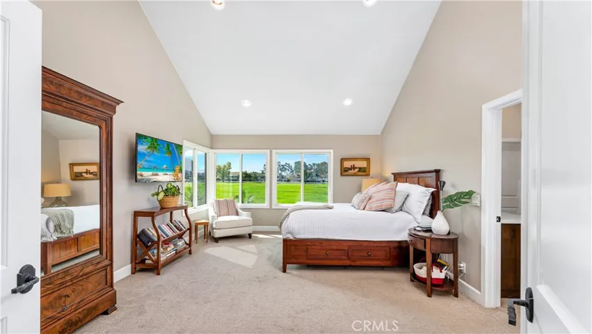 The Primary Bedroom features huge corner windows, is so very spacious with room for large pieces of furniture.