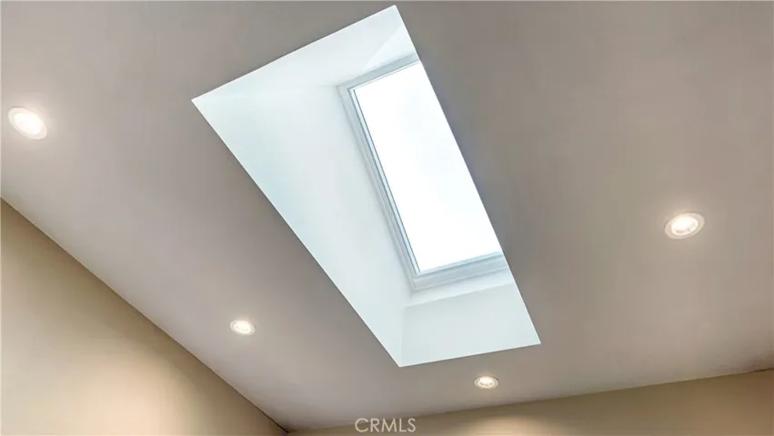 Velux solar powered skylight brings in even more light in.  It's openable by remote.