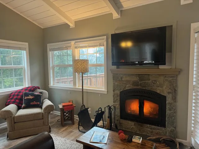 Come on inside and warm up by the very efficient wood burning, heatilator fireplace.