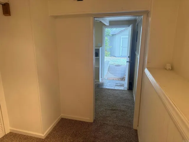 Door from the walk-out basement, bedroom leads out to a covered patio.