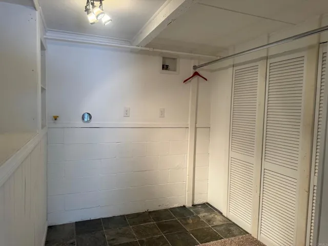 Large walk-in closet with hook ups for your washer dryer.