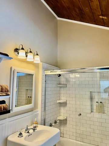 Open ceiling in the totally remodeled full bath.