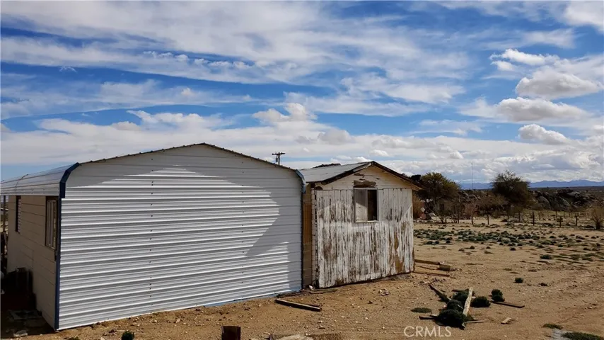 Westside of the homestead shop/carport.