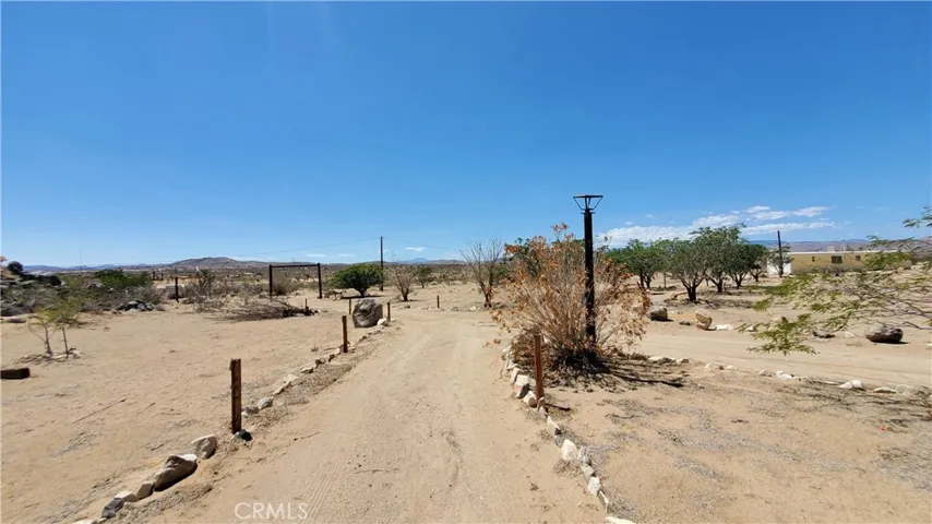 Driveway up to the rec. cabin. Mobile on the right side.