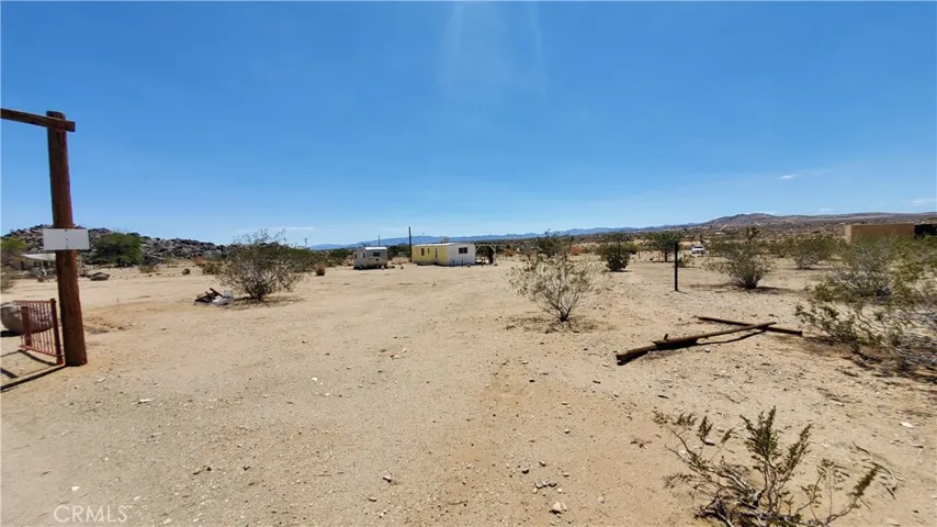 Looking towards the mobile from the eastern edge of the property.