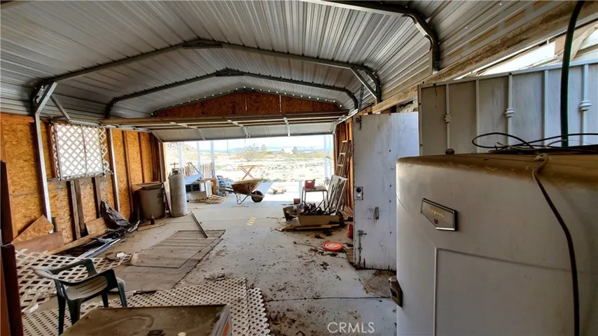 From the backend of the shop looking east out the rollup garage door.