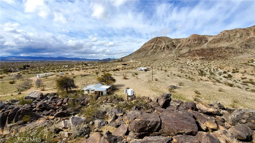 From the rock outcrop the three-parcel compound with Goat Mountain on the right half of the pic.