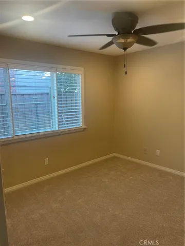 each bedroom has a ceiling fan and recessed lights