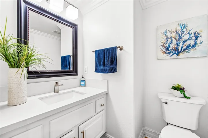 Powder room on 1st floor.