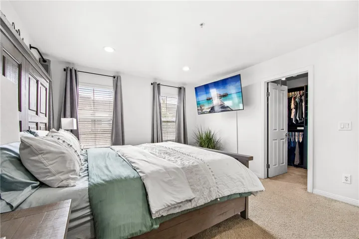 Walk in closet in primary bedroom