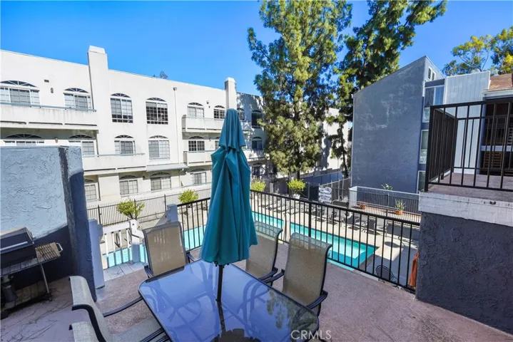 Balcony overlooking pool