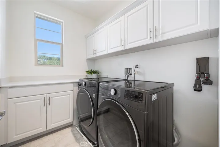 Laundry room upstairs for convenience