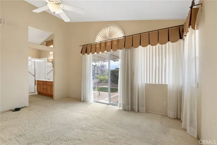Primary bedroom with an en-suite bath and a walk-in closet.