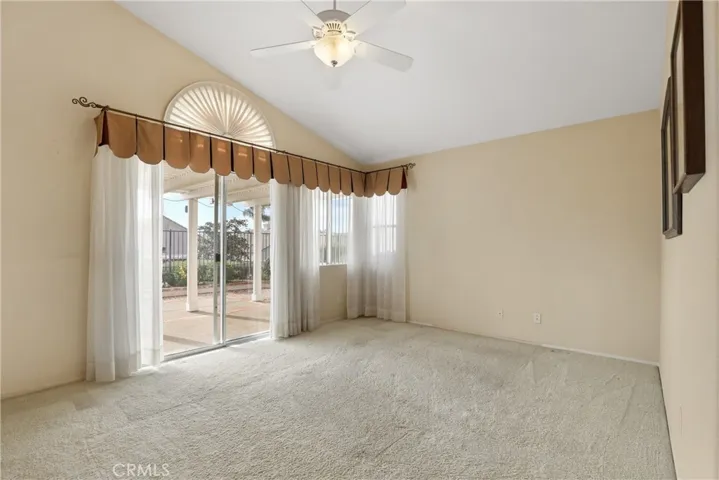 Your primary bedroom is so spacious with a sliding door to the patio.