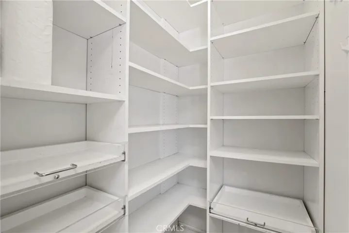 You will love the walk-in pantry in the kitchen.