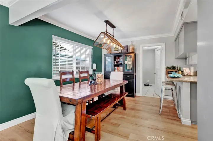 Dining Room is Open to Upgraded Kitchen with Breakfast Bar