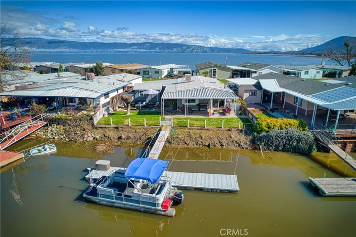 Living on the lake/lagoons is your dream come view this turn key home