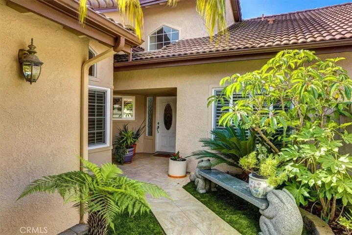 The moment you step through the private gated entry, you are enveloped with the warmth and charm of this peaceful residence.