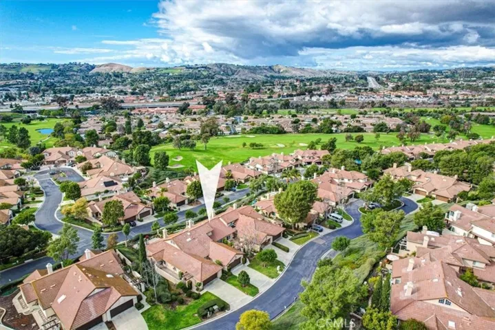 Located on a prime cul-de-sac in Mesa Vista, a private community perched above the San Juan Hills Golf Course and surrounded by rolling hills.