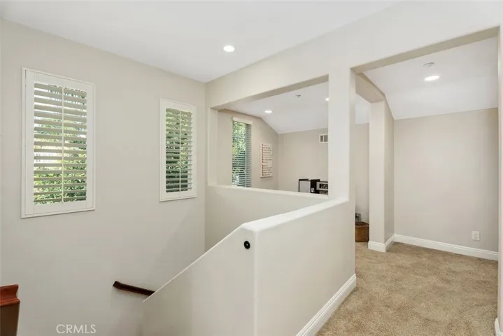 Upstairs landing area with nook for office/play area.