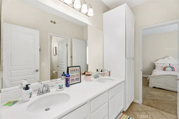 Kids bathroom with dual sinks