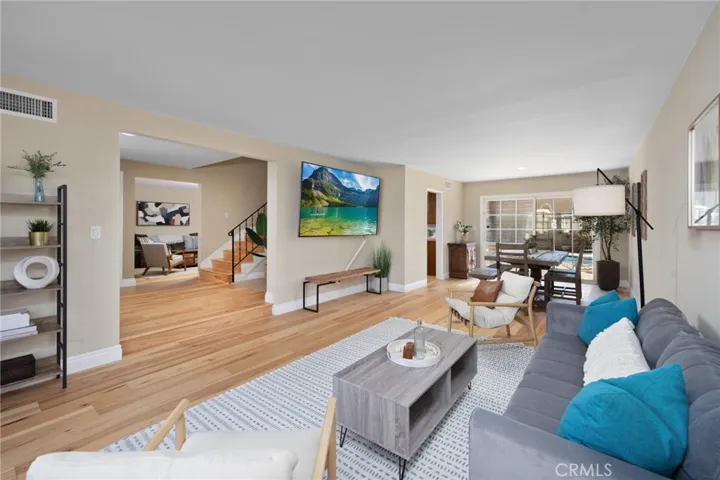 The living room and dining room is an architectural design providing an alluring, yet functional, floor plan!