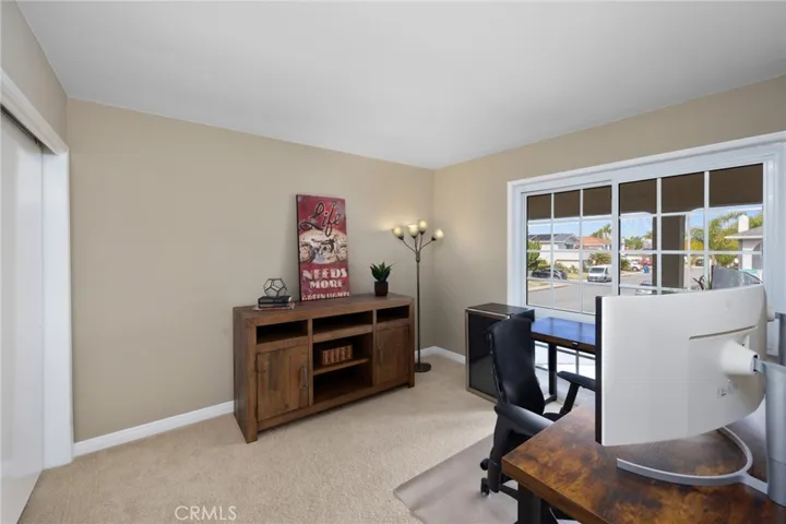 Upstairs bedroom #2 currently being used as an in-home office