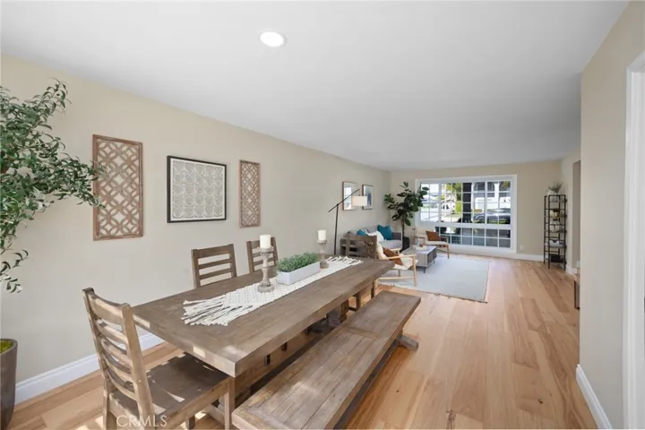 The living room & dining room are seamlessly connected to the kitchen creating an ideal space to host family and guests.