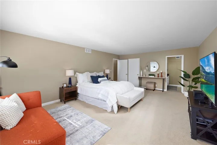 Primary Suite with walk-in closet and remodeled bath ~ Ample room to incorporate large size furniture pieces ~