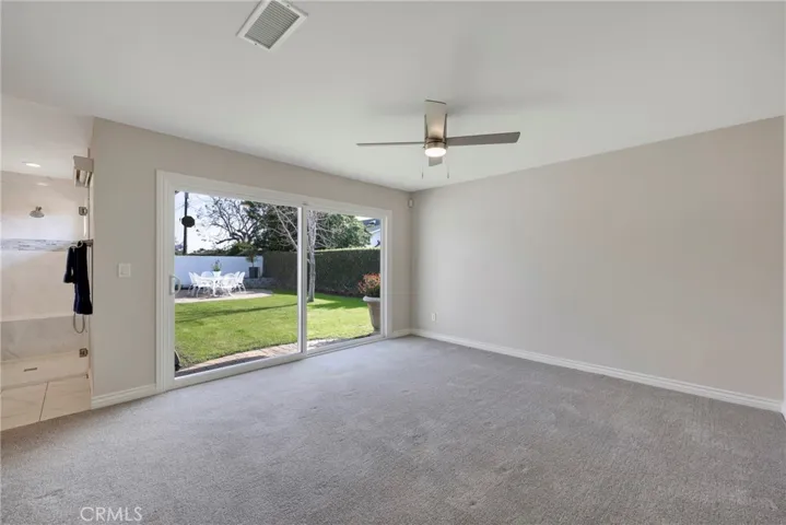 Huge slider in primary bedroom to backyard