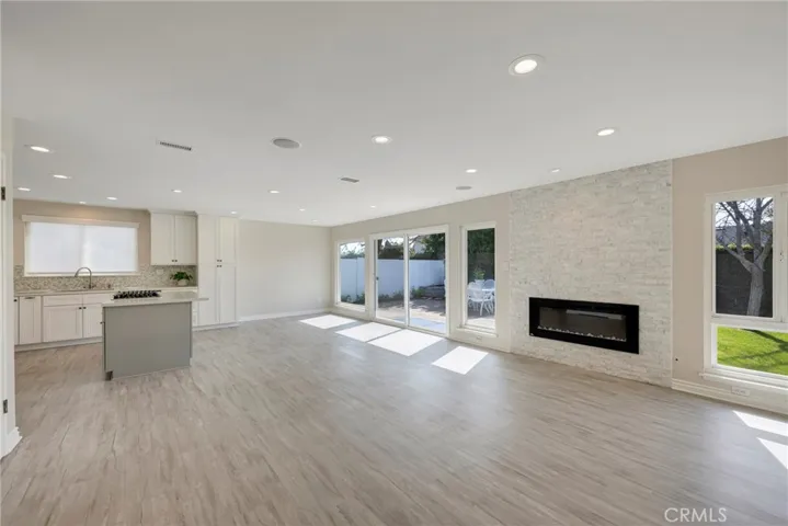 Abundant light with wall to wall windows and slider