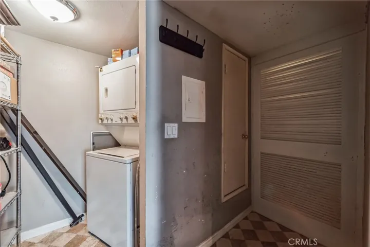 Laundry room/storage off of first floor bedroom/office