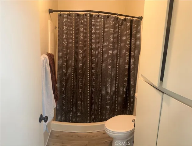 aster Bathroom Shower and Toilet Area