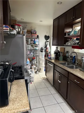 Kitchen with Tile Floor 
 & Granite Countertops, Unit #4