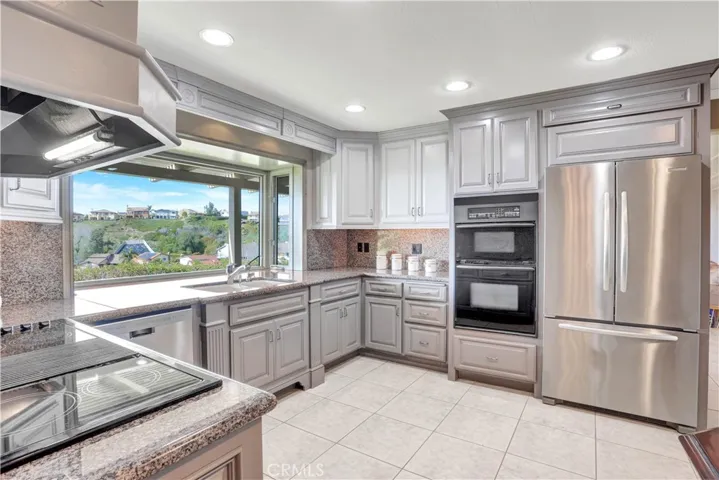 Gourmet Kitchen with Stainless Steal Appliances. Love the ocean views!