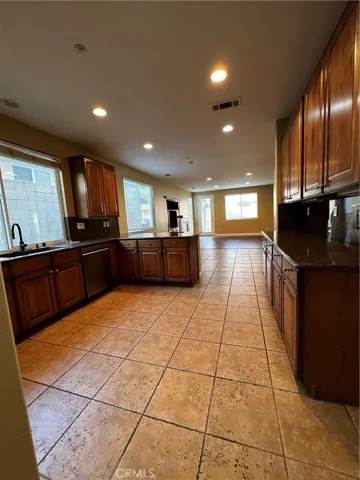 view of kitchen from garage door. Kitchen has access to garage.
