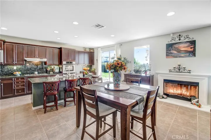 Family Dining, large eating area at kitchen island, cozy fireplace