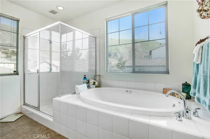 Master bathroom with separate shower, Jacuzzi soaking tub