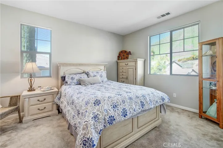 Bedroom #2 is like a second master suite. This bedroom has its own full bathroom, and a recessed sitting area