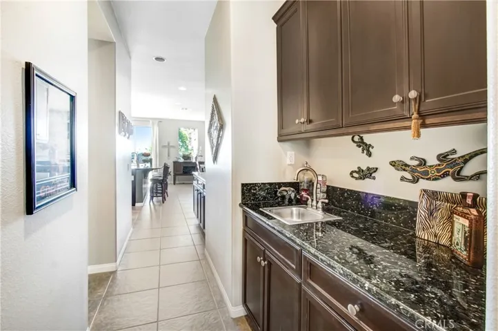 Butler pantry with sink off dining room